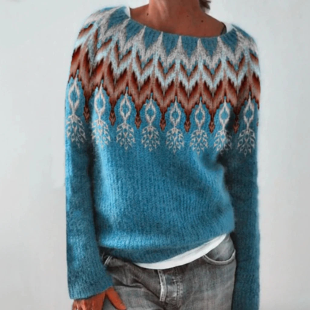 Blue green patterned crew neck sweater, front view