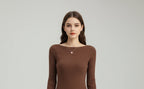 Close-up of brown ribbed boat neck sweater neckline