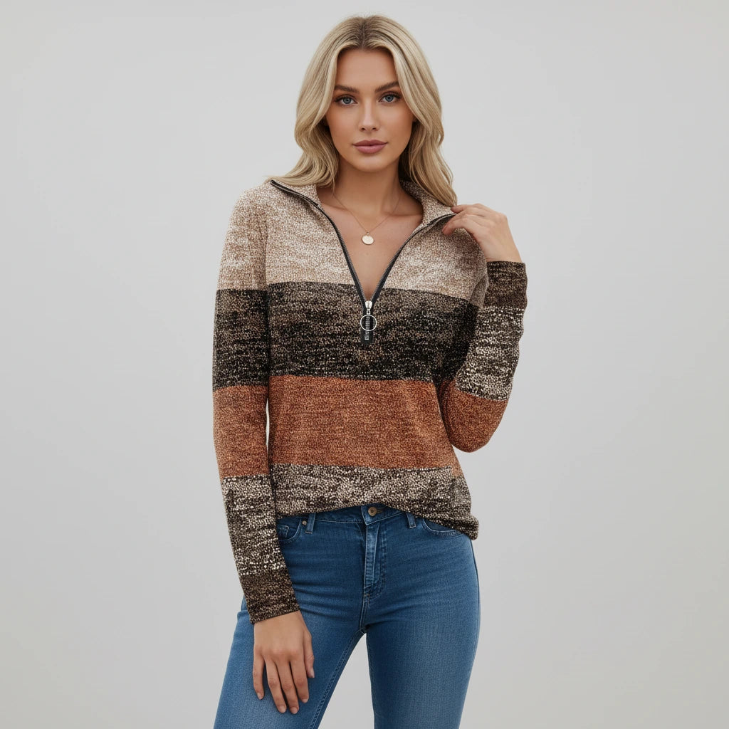 Woman wearing brown printed quarter zip sweater, studio photo