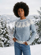Cloudy blue vintage fair isle knit sweater on model, outdoor winter setting