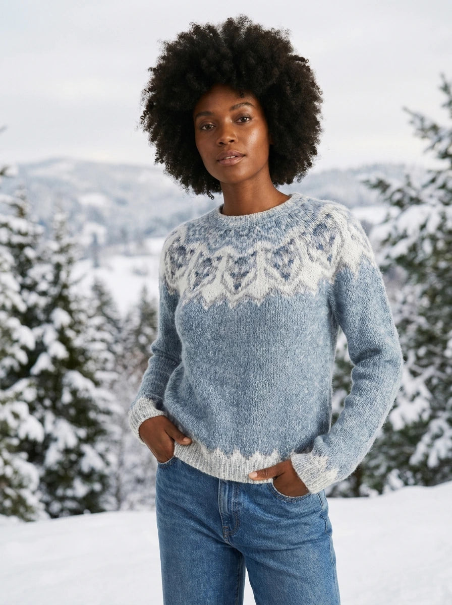 Cloudy blue vintage fair isle knit sweater on model, outdoor winter setting