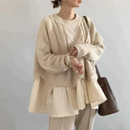 Cream cable knit round neck sweater with layered hem, front view