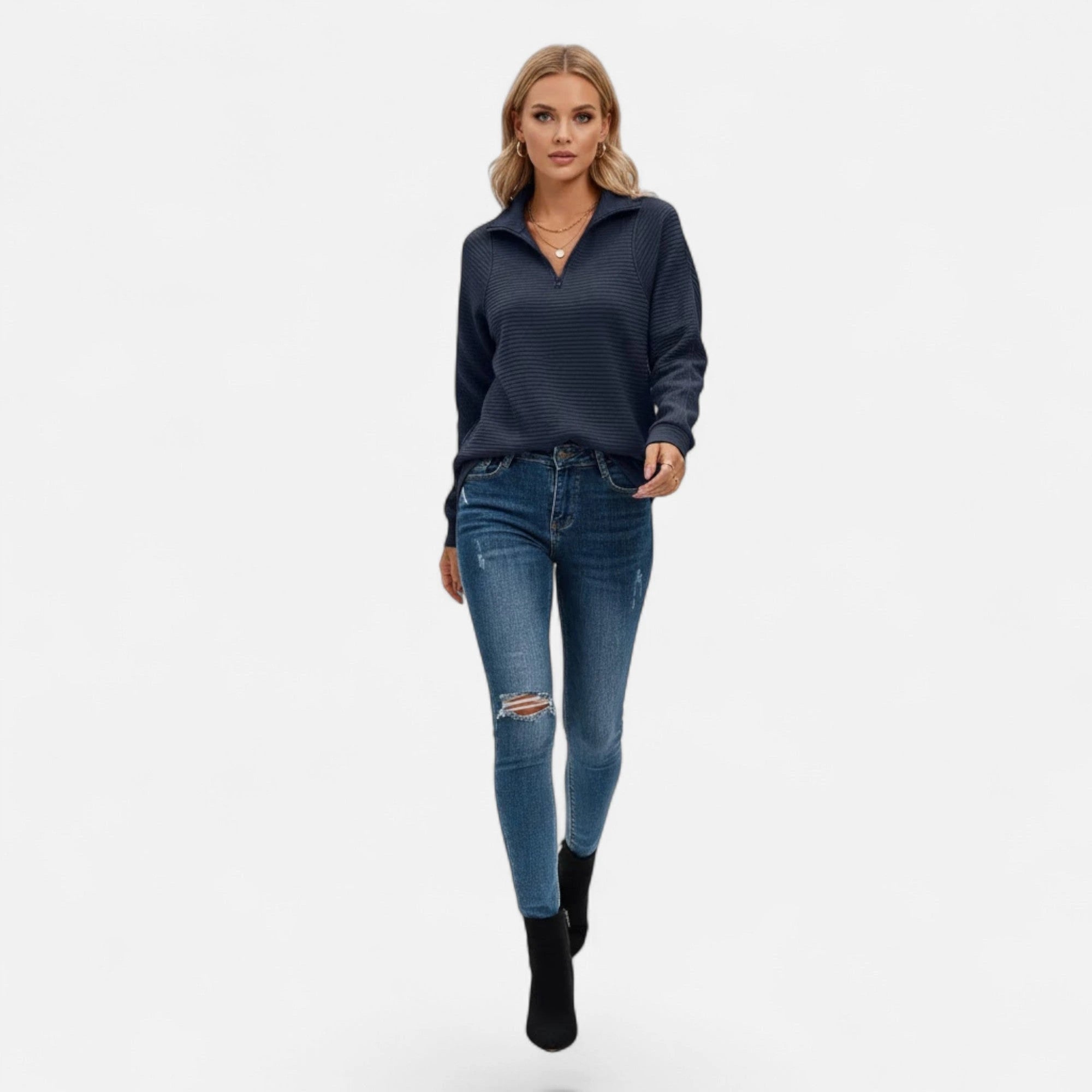 Woman wearing dark blue zipper stand-collar ribbed knit sweater