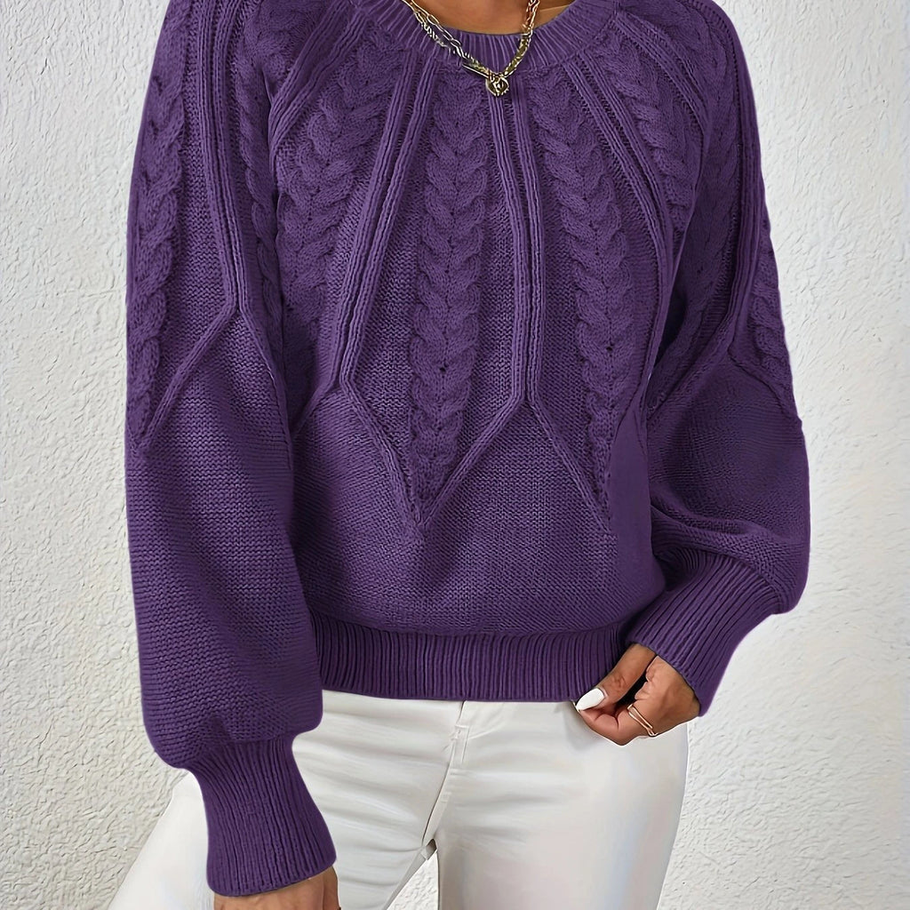 Woman wearing a dark purple voluminous sleeve sweater with cable knit texture