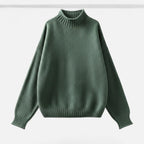 Green mock-neck knit sweater, flat lay