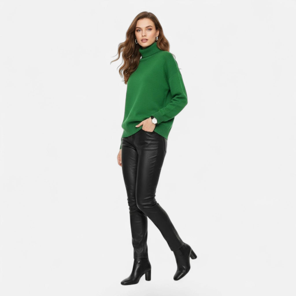 Green oversized turtleneck sweater on model