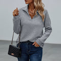 Grey ribbed quarter-zip sweater, front view