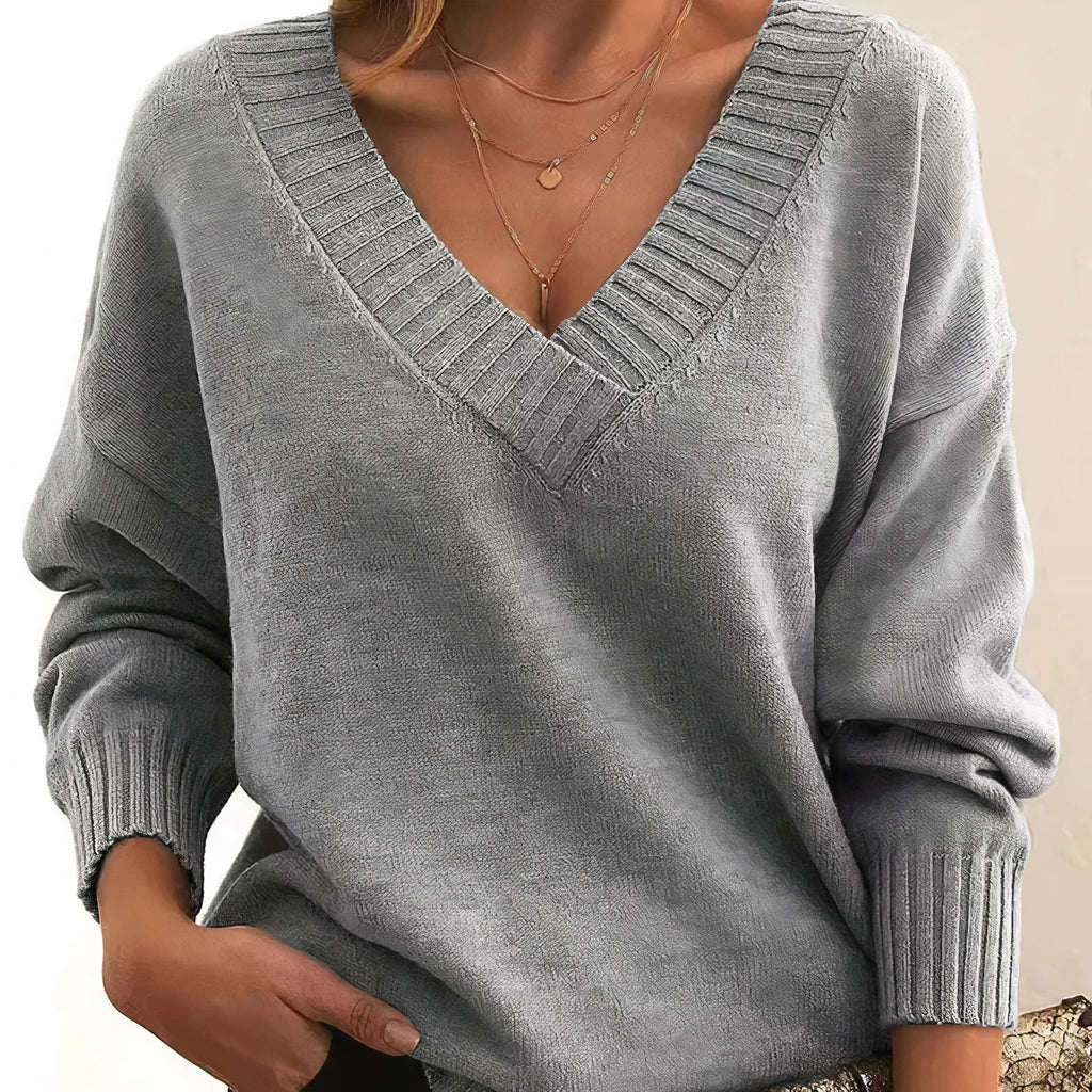 Grey cashmere V-neck balloon sleeve sweater on model