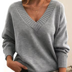 Grey cashmere V-neck balloon sleeve sweater on model