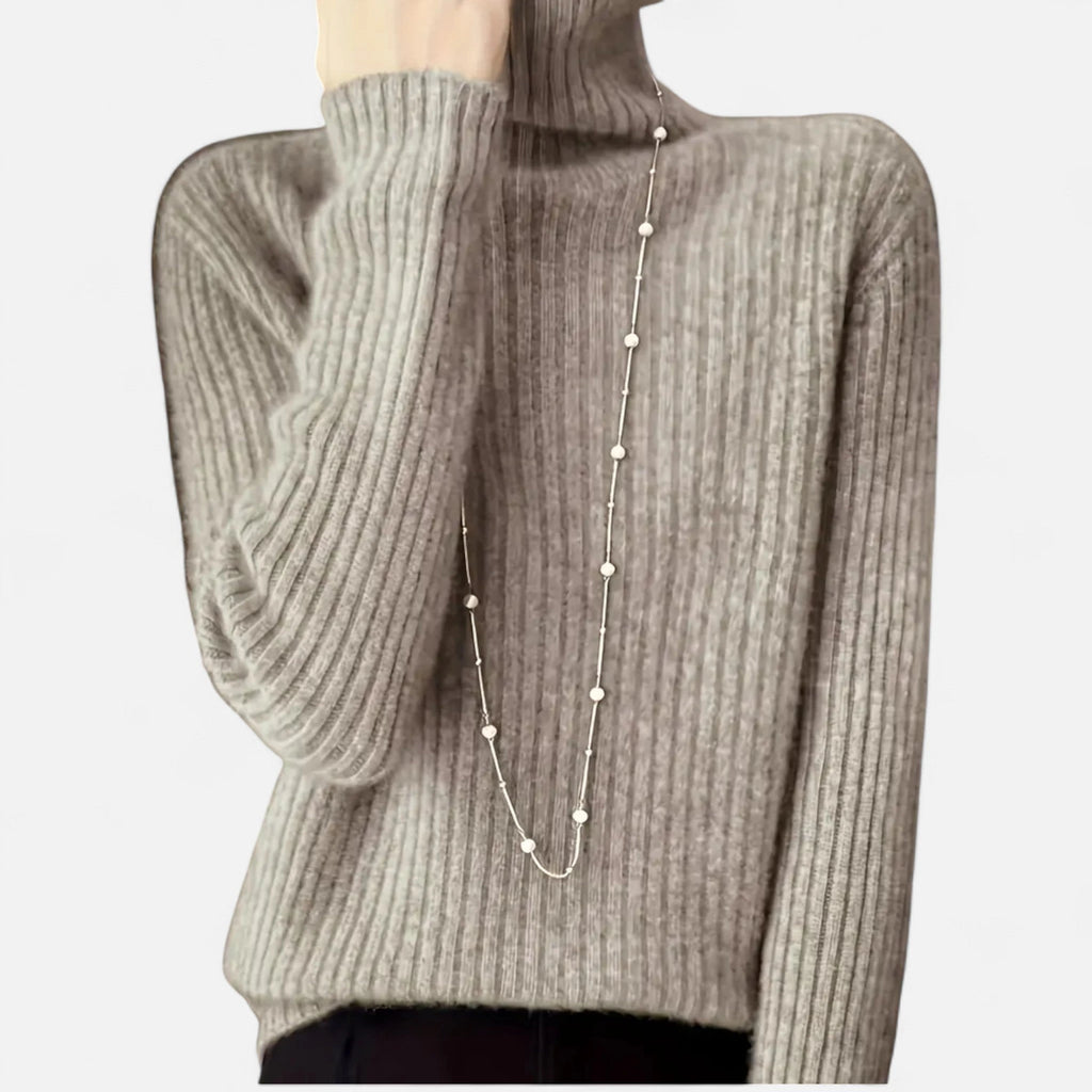 Khaki ribbed turtleneck sweater, close-up neckline detail