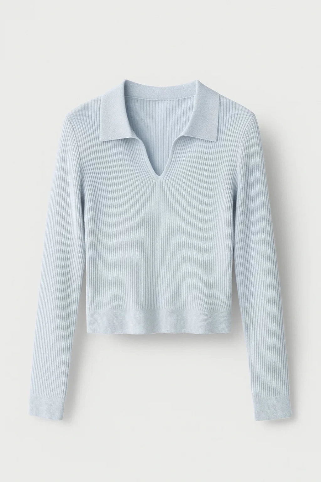 Light blue ribbed cropped V-neck sweater with collar, flat lay