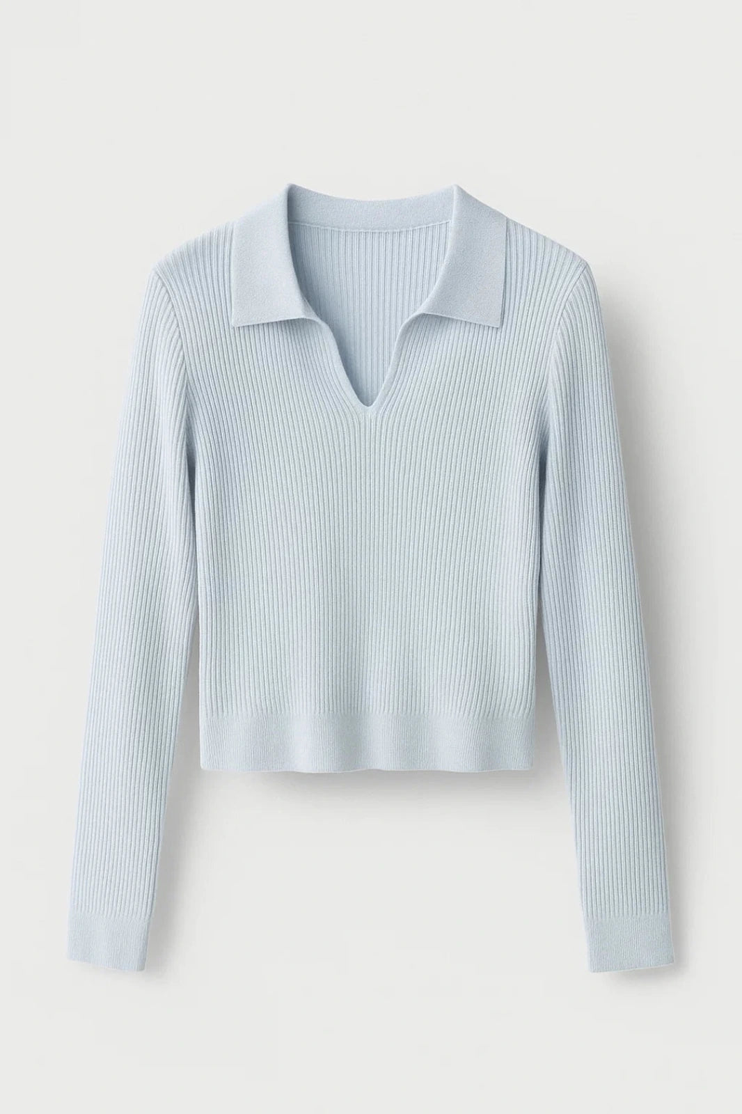Light blue ribbed cropped V-neck sweater with collar, flat lay