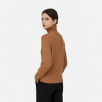 Light brown ribbed turtleneck sweater, side view