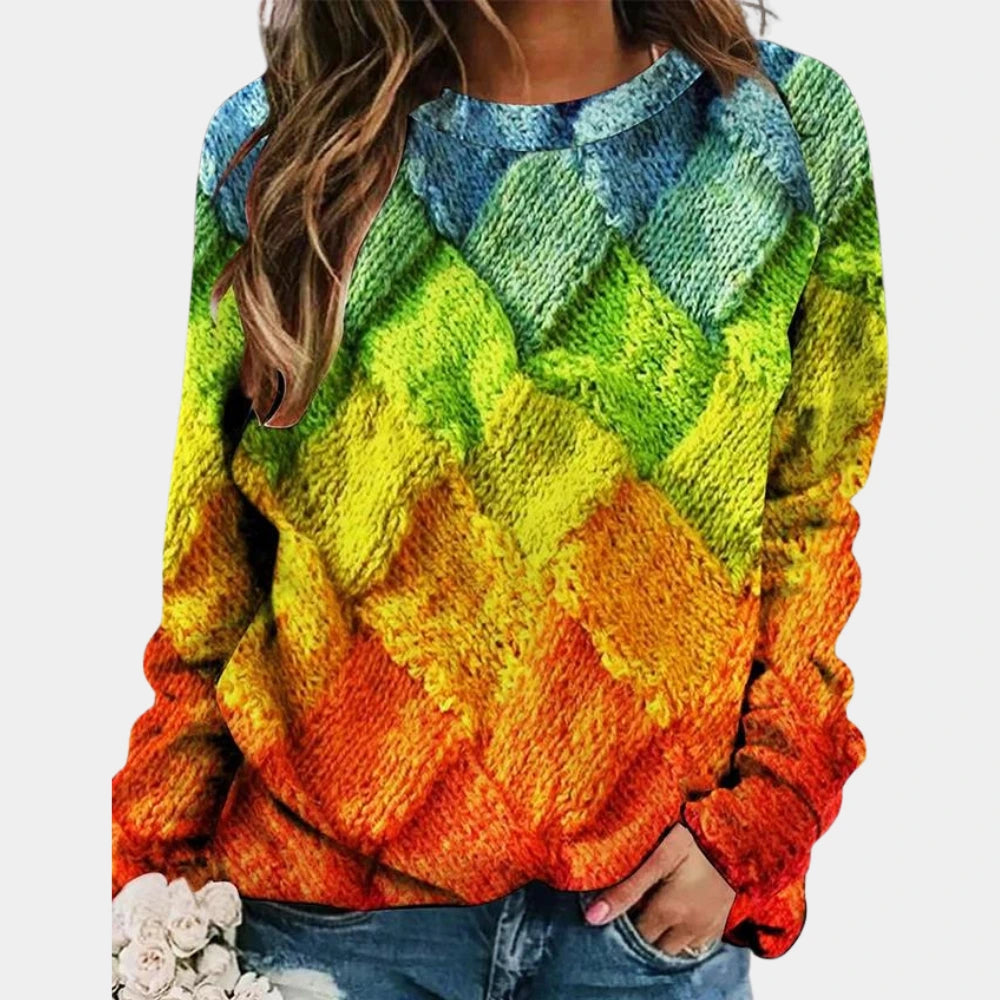 Woman wearing a light green colorblock diamond knit sweater with long sleeves