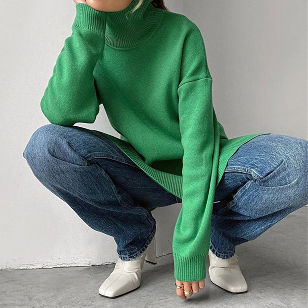Driftly turtleneck sweater in light green with relaxed fit and side split