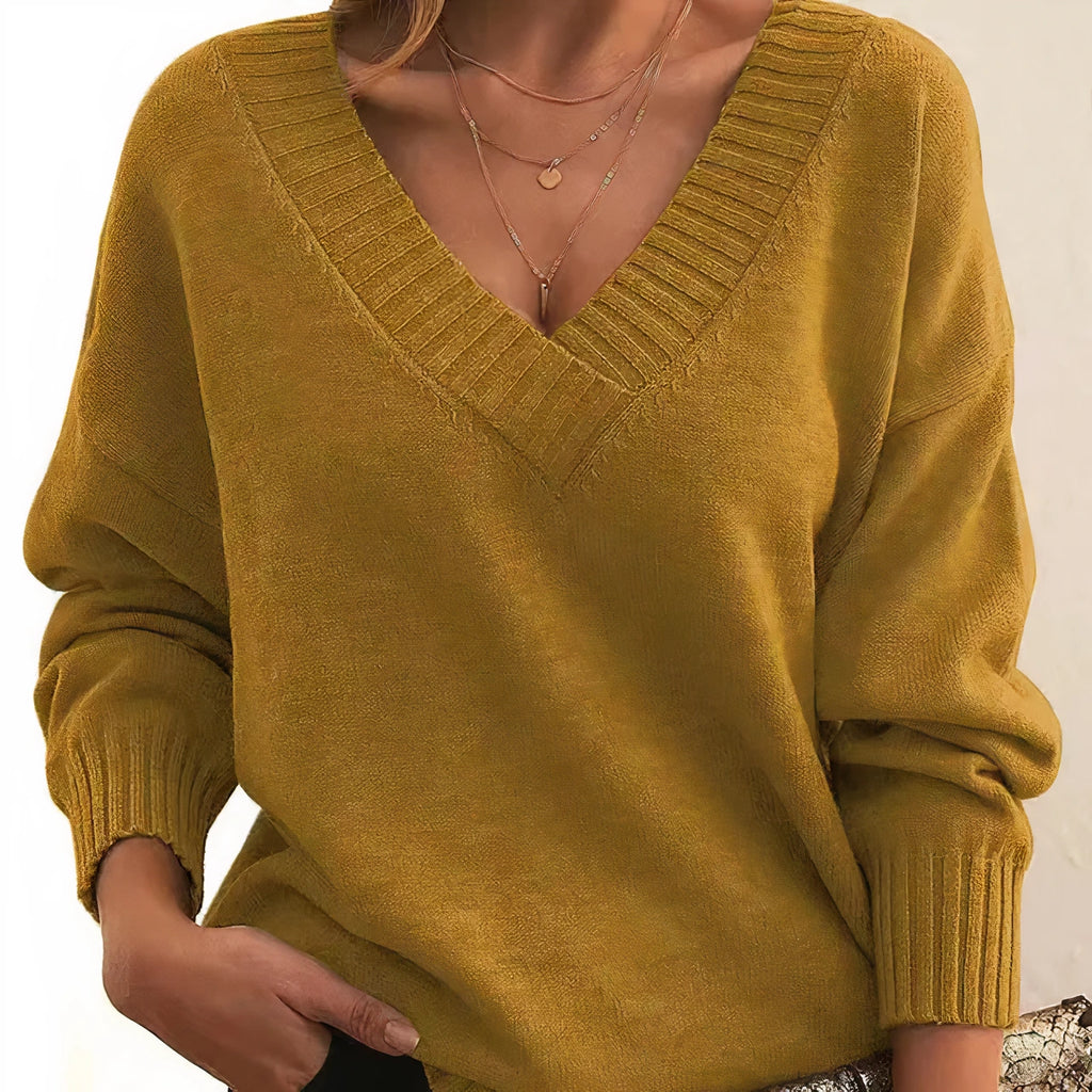 Mustard yellow cashmere V-neck balloon sleeve sweater on model