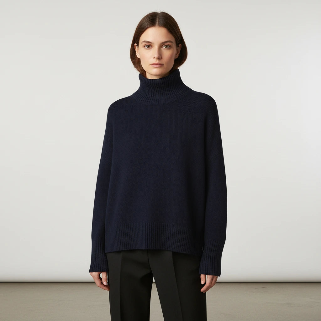 Navy blue oversized turtleneck sweater with dropped shoulders, front view