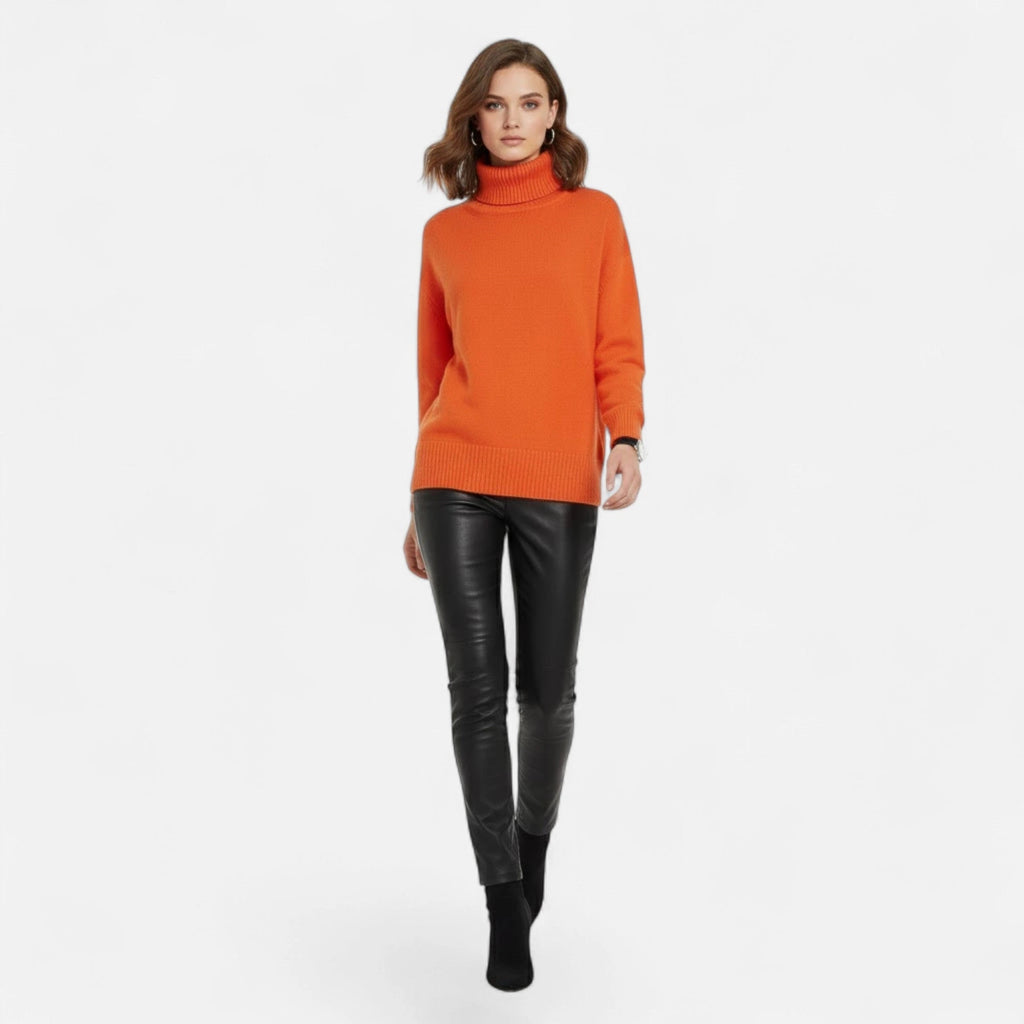Orange oversized turtleneck sweater on model