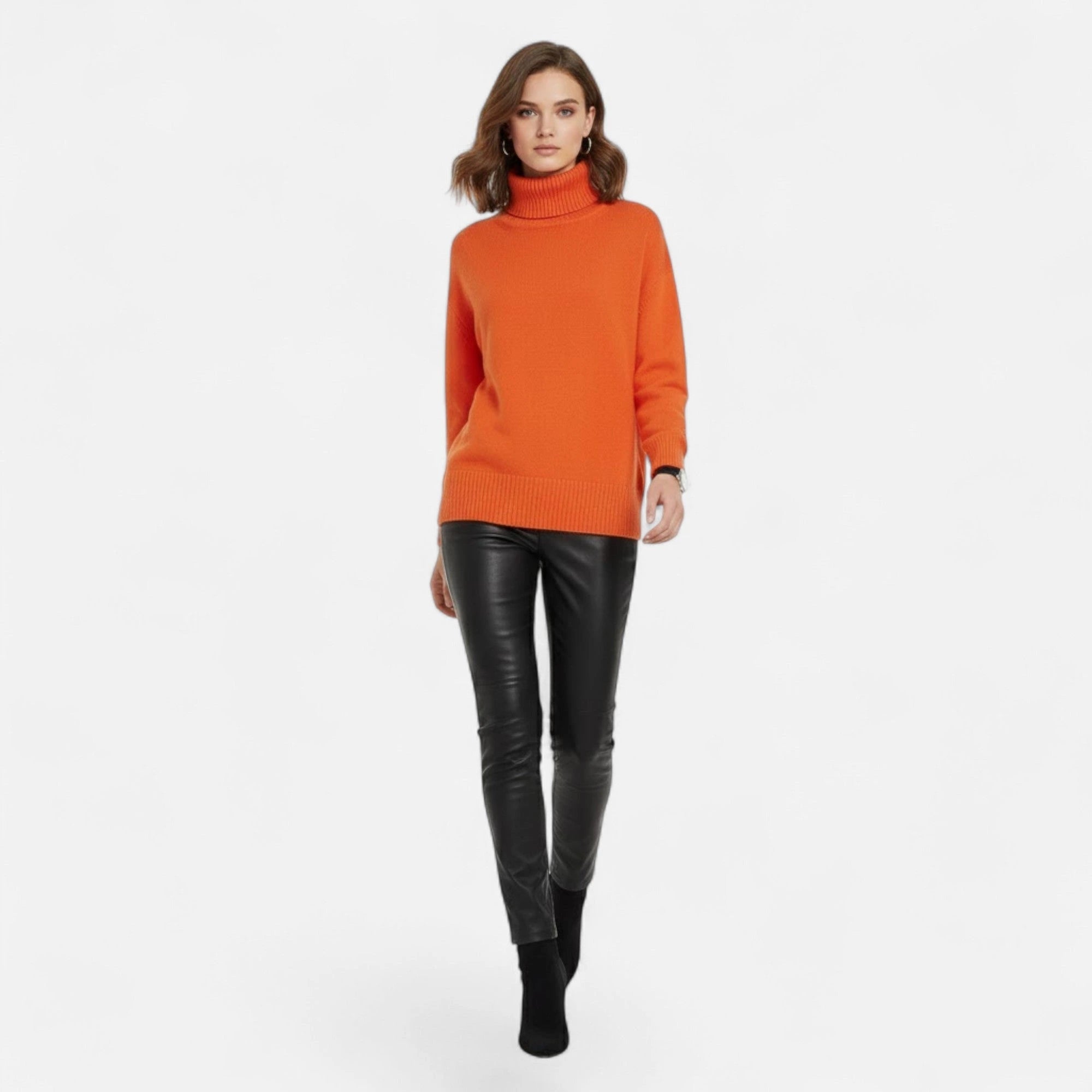 Orange oversized turtleneck sweater on model