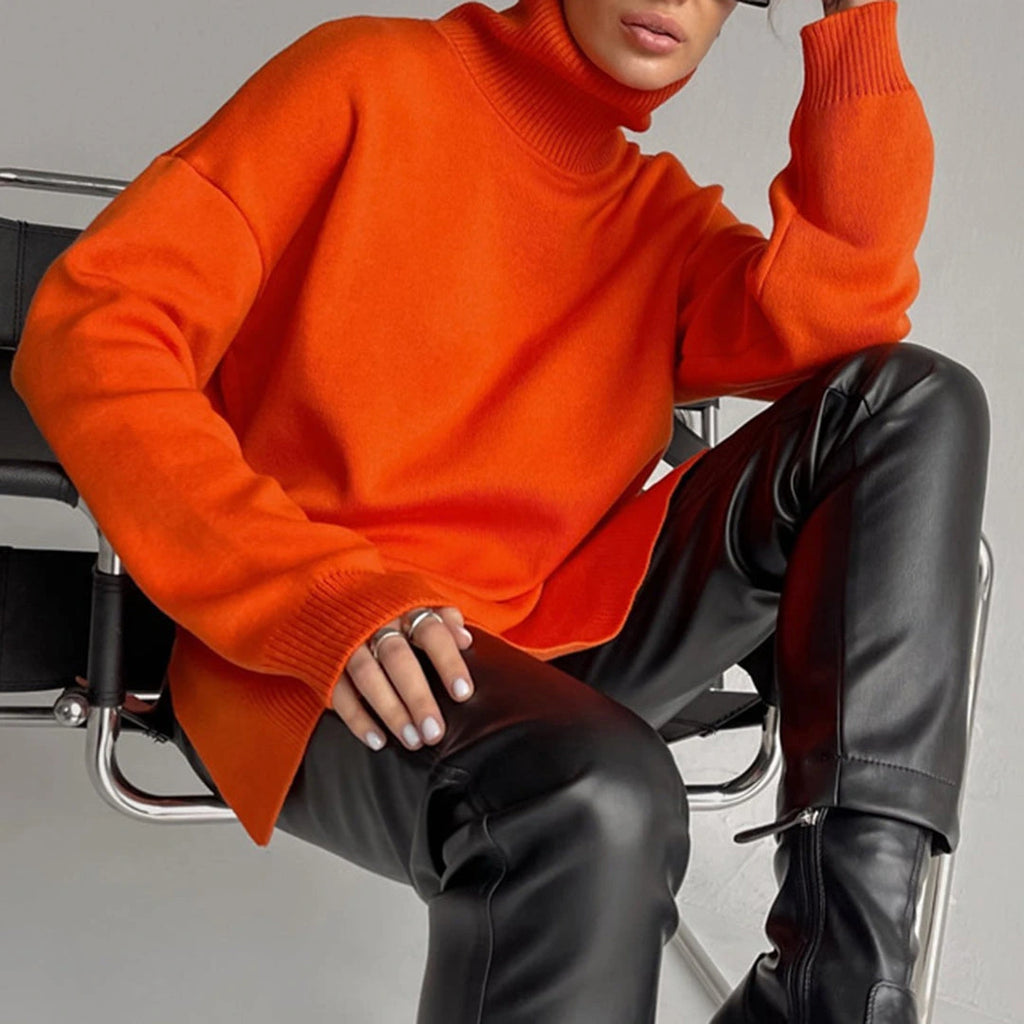 Driftly turtleneck sweater in orange with relaxed fit and side split
