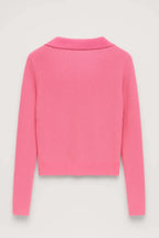 Pink ribbed cropped V-neck sweater with collar, flat lay front