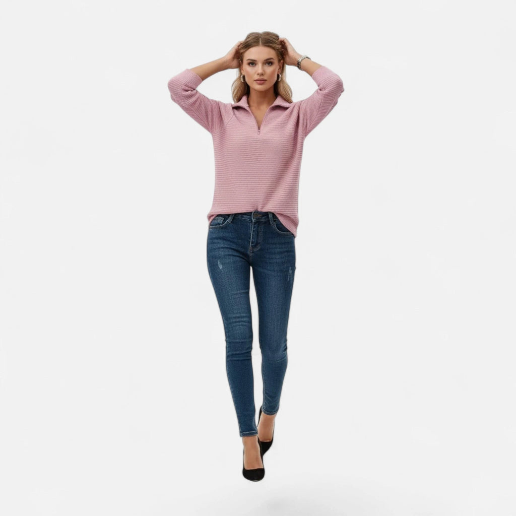 Woman wearing pink zipper stand-collar ribbed knit sweater