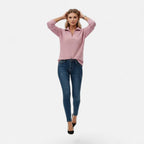 Woman wearing pink zipper stand-collar ribbed knit sweater