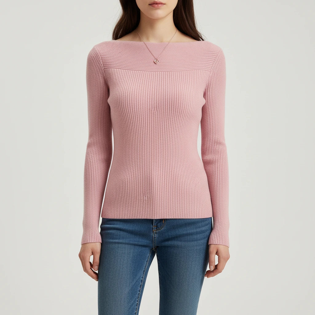 Woman wearing pink ribbed boat neck sweater, studio photo