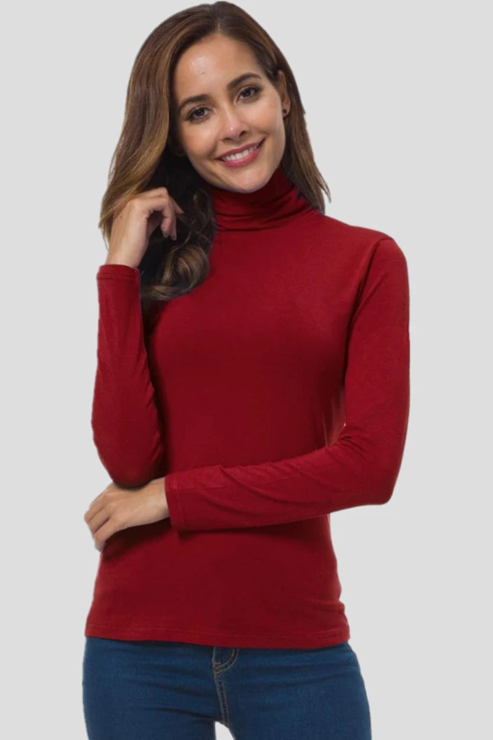Woman wearing a red turtleneck long sleeve plain sweater - studio photo