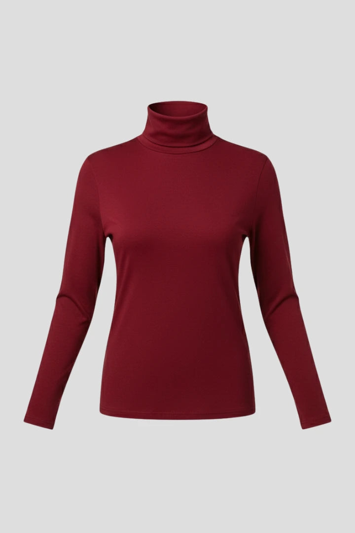 Woman wearing a red turtleneck long sleeve plain sweater - studio photo