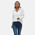 Woman wearing white zipper stand-collar ribbed knit sweater
