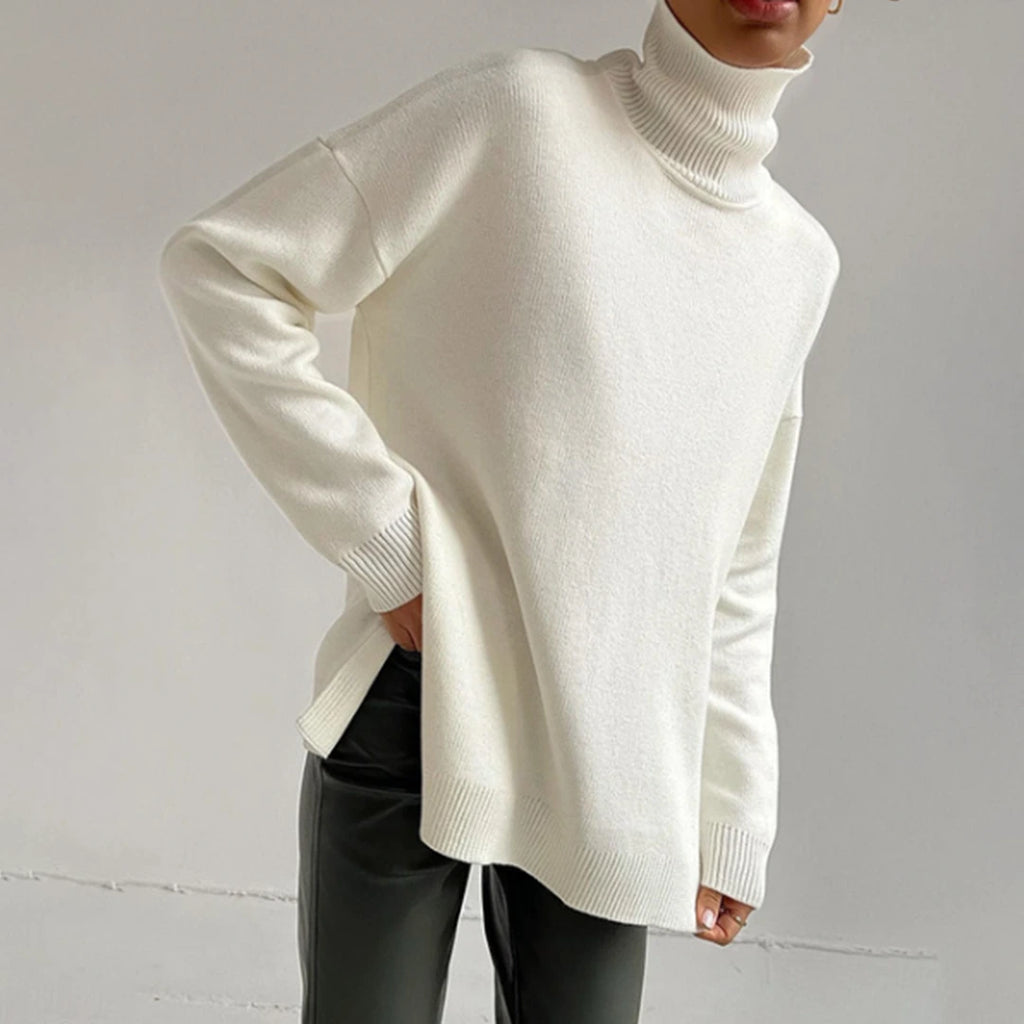 Driftly turtleneck sweater in white with relaxed fit and side split