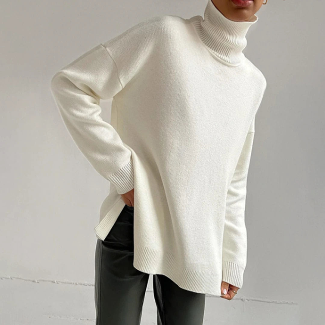 Driftly turtleneck sweater in white with relaxed fit and side split