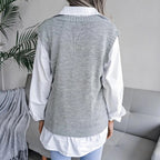 Back view of grey openwork sweater vest with relaxed fit
