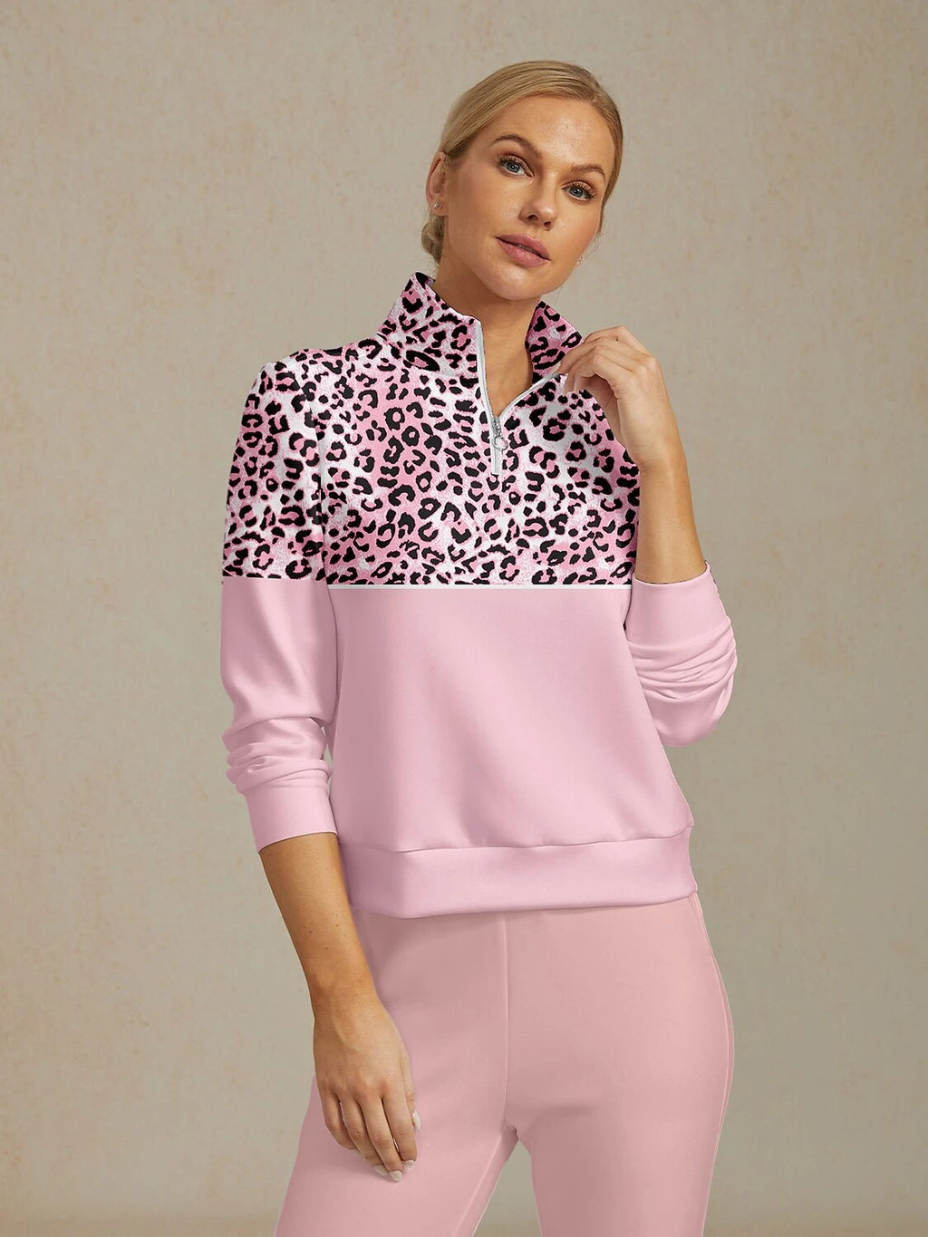 Dark pink leopard print golf sweatshirt, close-up