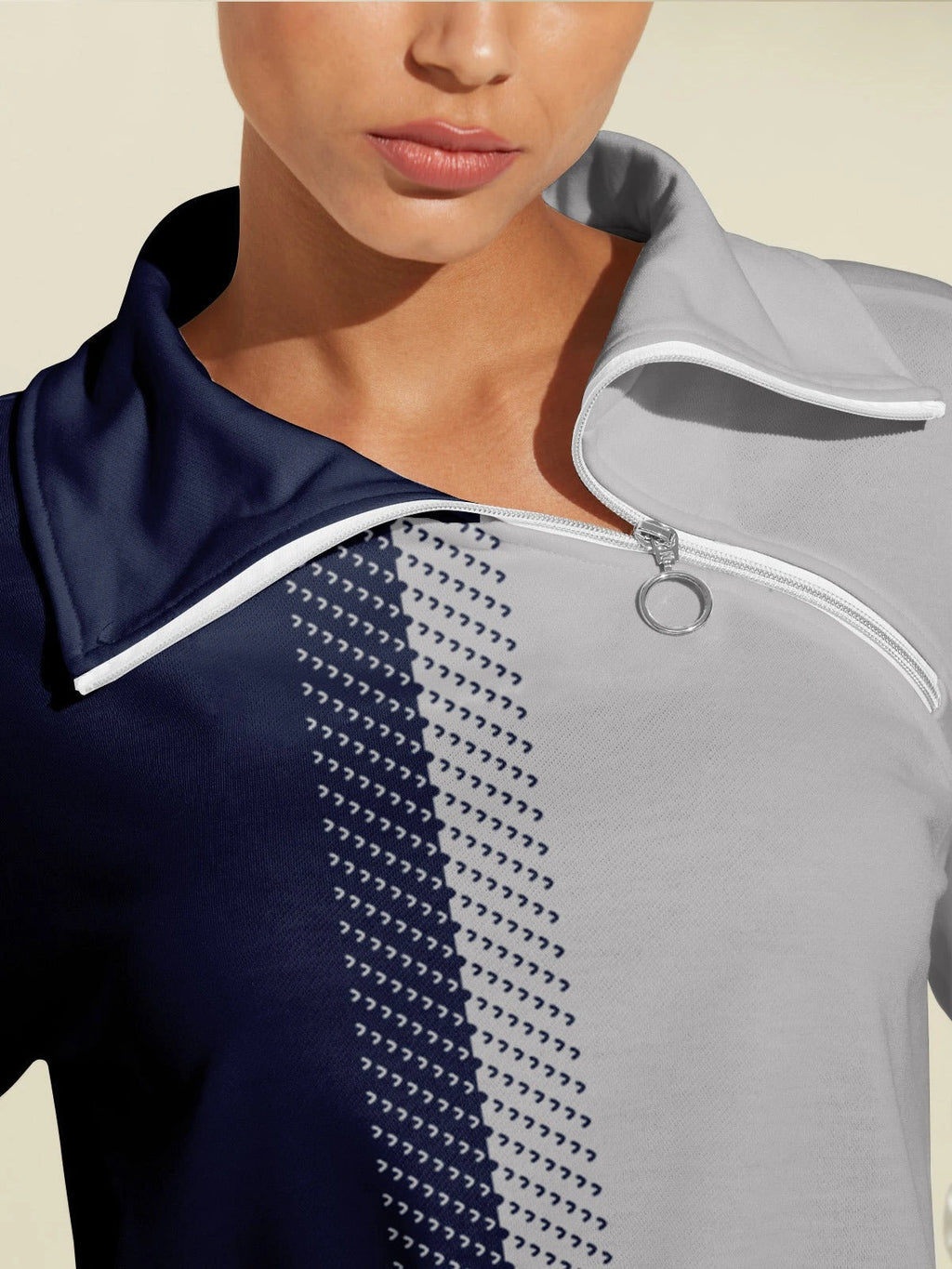 Quarter-zip collar detail on navy and grey golf sweatshirt