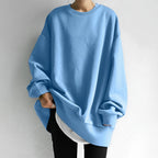 Sky blue oversized crew neck sweatshirt with dropped shoulders, front view