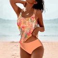 Woman wearing a orange high-waisted stretch quick-dry tankini set - lifestyle photo