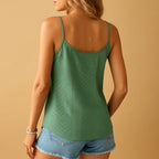 Woman wearing a white sleeveless lace trim v-neck top - lifestyle photo