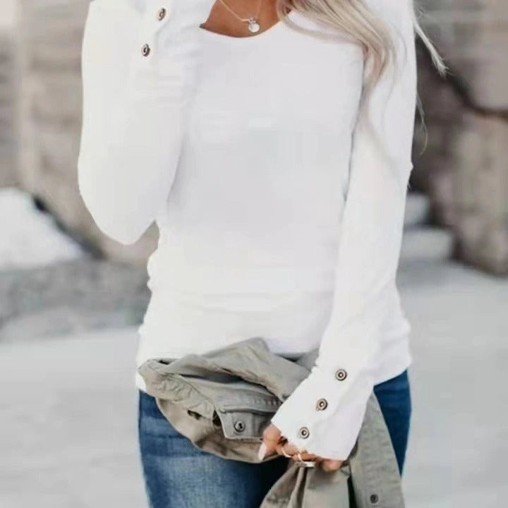 White long sleeve top button-cuff detail on model
