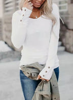 White long sleeve button-cuff top on model