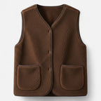 Dark coffee brown plush sherpa vest flat lay studio shot