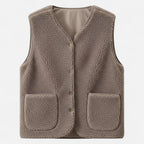 Light coffee taupe plush sherpa vest flat lay studio shot