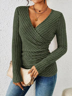 Driftly ribbed wrap top in olive green with V-neck and side button detail, front view