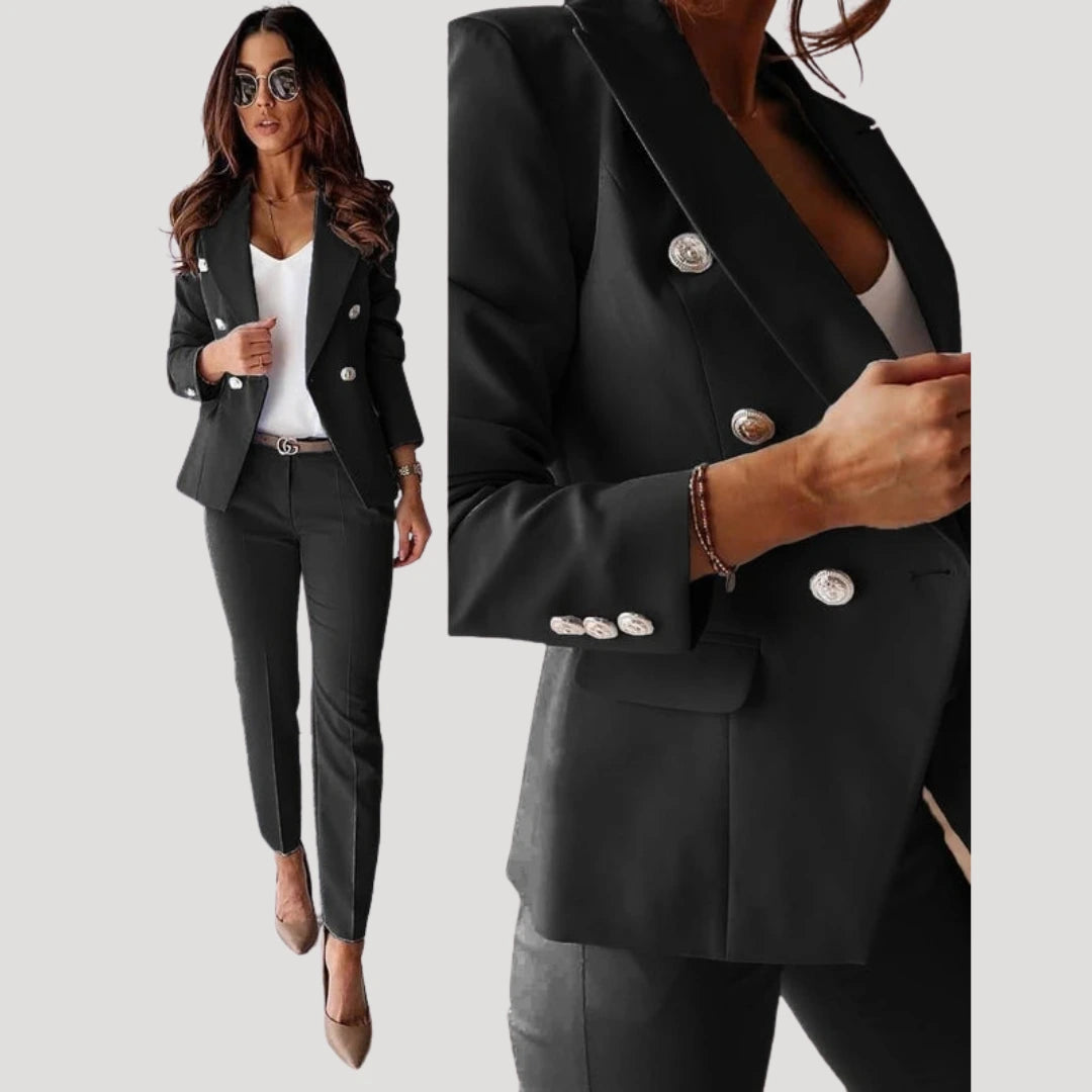 Woman wearing a black double-breasted tailored blazer and trouser set