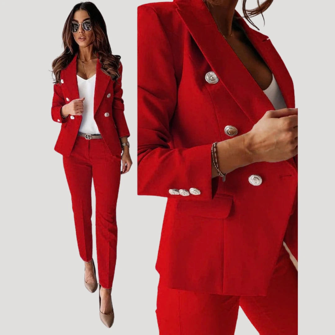 Woman wearing a red double-breasted tailored blazer and trouser set