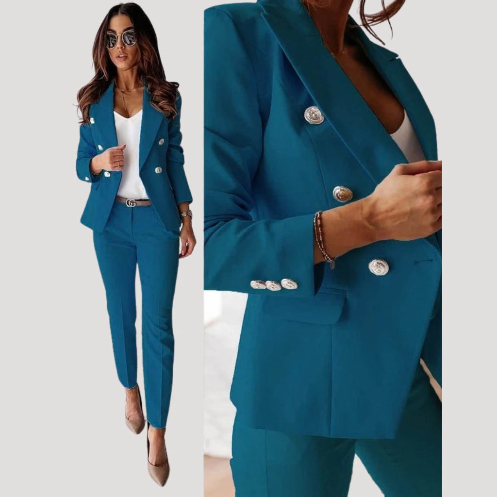 Woman wearing a blue double-breasted tailored blazer and trouser set