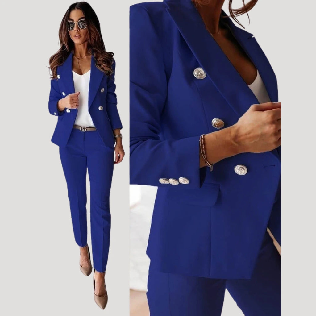 Woman wearing a navy blue double-breasted tailored blazer and trouser set