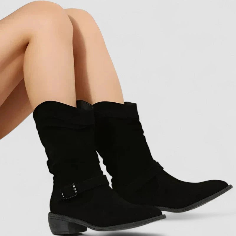 Black zipper ankle boots with arch support, sole and arch support detail