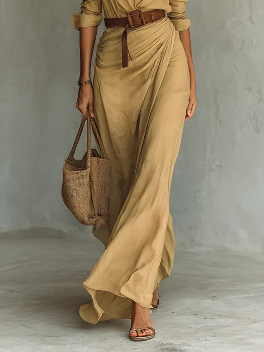 Close-up of a tan lapel collar belted maxi dress showing the belt and wrap skirt detail
